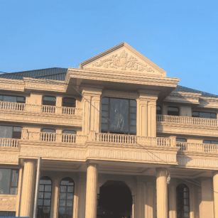 惠州黄金麻别墅外墙干挂石材效果示例