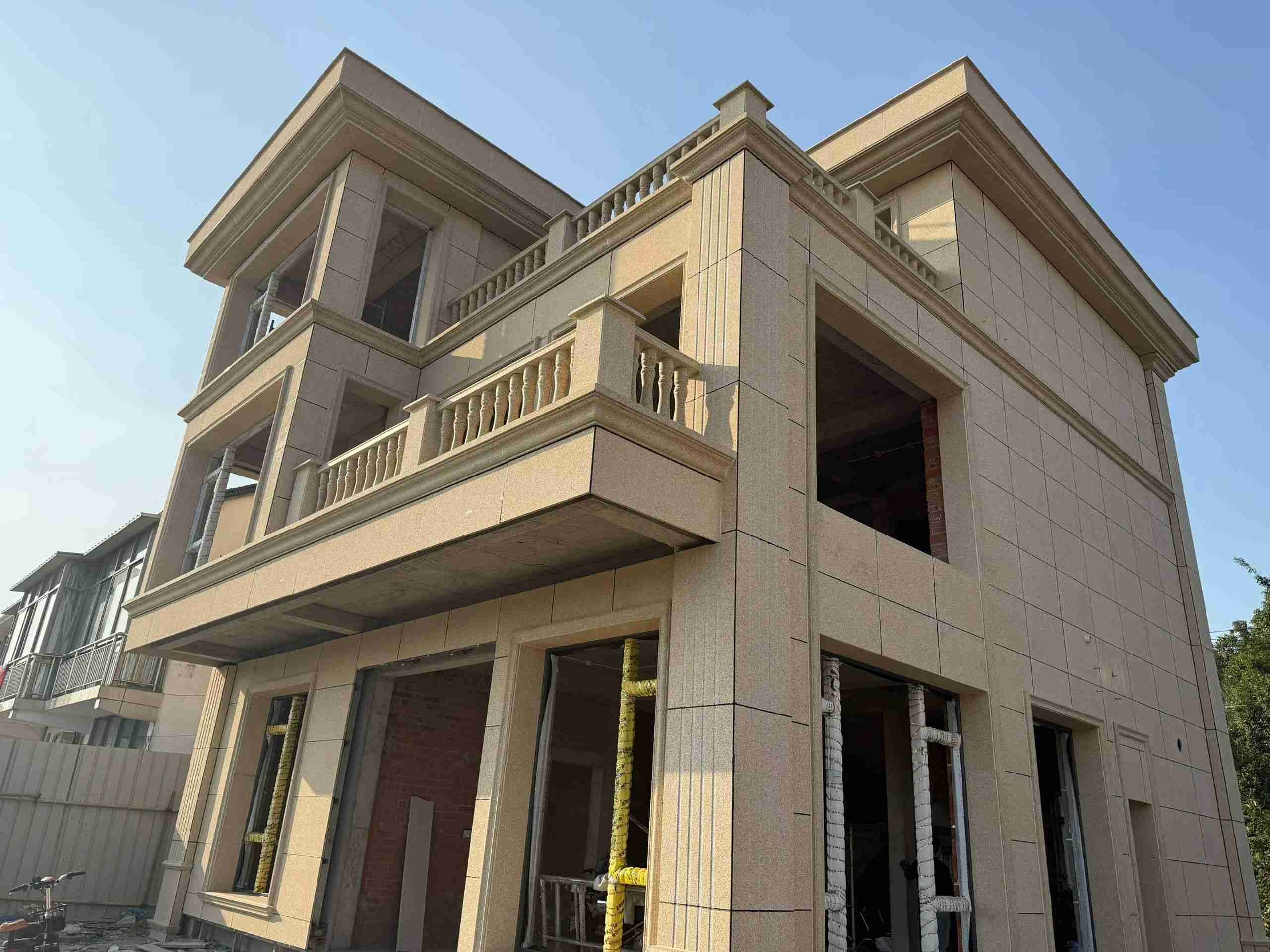 惠州 黄金麻花岗岩石材荔枝面外墙干挂效果展示